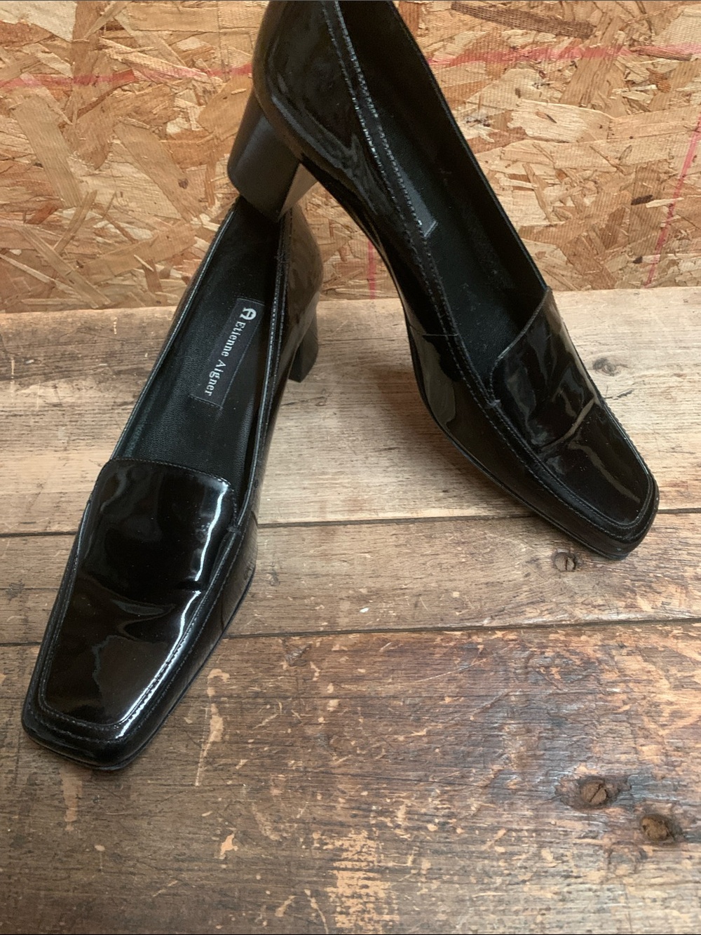 Etienne Aigner black pat pumps